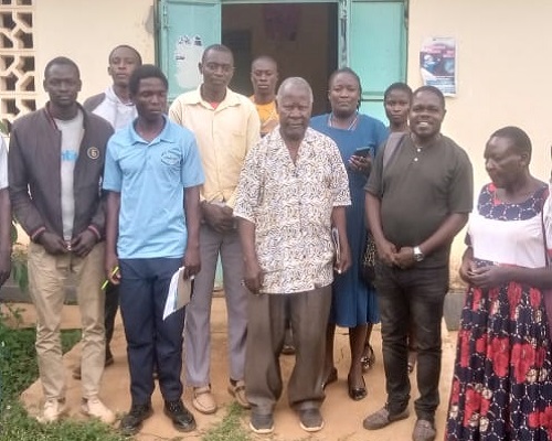 Youths and the board of management outside Kabwodo Dispensary