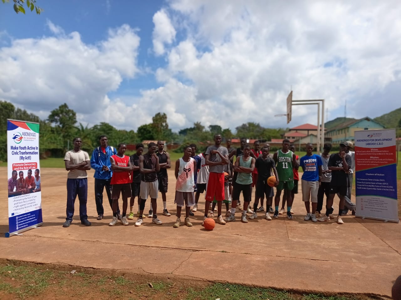 Teams line up on the court at the second Annual ABENENGO Basketball Festival